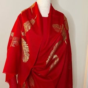 100% cashmere scarf with gold leaf prints across the scarf